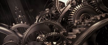 Movie still from “The Lincoln Lawyer” (2011), directed by Brad Furman – View of a bunch of metal gears; Extreme Close Up shot, Overhead angle