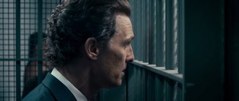 Movie still from “The Lincoln Lawyer” (2011), directed by Brad Furman – A person looking out of a window; Close Up shot, Over the shoulder angle