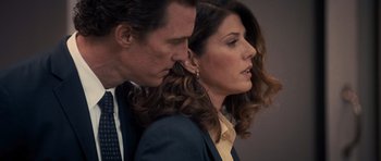 Movie still from “The Lincoln Lawyer” (2011), directed by Brad Furman – A man and a woman standing next to each other; Close Up shot, Over the shoulder angle