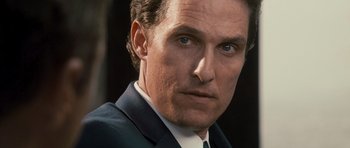 Movie still from “The Lincoln Lawyer” (2011), directed by Brad Furman – A person wearing a suit and tie; Close Up shot, Low angle
