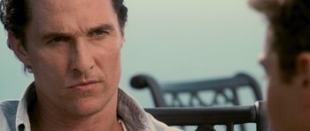 Movie still from “The Lincoln Lawyer” (2011), directed by Brad Furman – A person sitting on a bench; Close Up shot, Over the shoulder angle