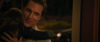 Movie still from “The Lincoln Lawyer” (2011), directed by Brad Furman – A person hugging another person; Close Up shot, Over the shoulder angle