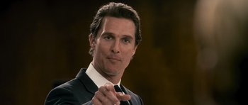 Movie still from “The Lincoln Lawyer” (2011), directed by Brad Furman – A person wearing a suit and tie; Close Up shot, Low angle