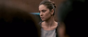 Movie still from “The Lincoln Lawyer” (2011), directed by Brad Furman – A person wearing a dress; Close Up shot, Over the shoulder angle