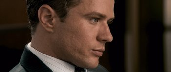 Movie still from “The Lincoln Lawyer” (2011), directed by Brad Furman – A person wearing a suit and tie; Extreme Close Up shot, High angle