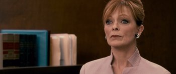 Movie still from “The Lincoln Lawyer” (2011), directed by Brad Furman – An older woman is looking into the distance; Close Up shot, Over the shoulder angle