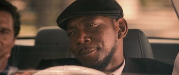 Movie still from “The Lincoln Lawyer” (2011), directed by Brad Furman – A person wearing a hat; Close Up shot, Low angle