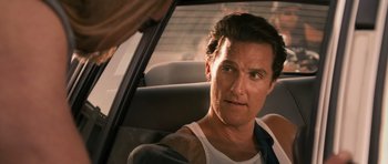 Movie still from “The Lincoln Lawyer” (2011), directed by Brad Furman – A person sitting in a car; Close Up shot, Over the shoulder angle