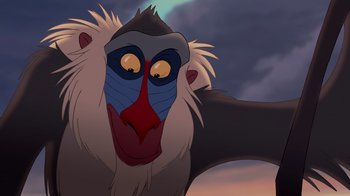 Movie still from “The Lion King” (1994), directed by Rob Minkoff – Rafiki from the lion king; Close Up shot, Overhead angle
