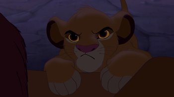 Movie still from “The Lion King” (1994), directed by Rob Minkoff – A lion cub's face at night; Close Up shot, High angle