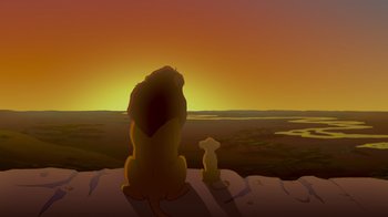 Movie still from “The Lion King” (1994), directed by Rob Minkoff – A lion and a small cub sitting on a cliff; Wide shot, Low angle