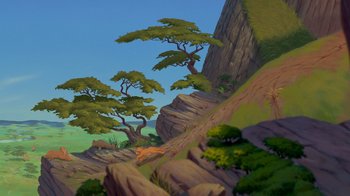Movie still from “The Lion King” (1994), directed by Rob Minkoff – A painting of a lion on a mountain side; Extreme Wide shot, Low angle