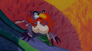 Movie still from “The Lion King” (1994), directed by Rob Minkoff – A painting of a colorful bird with an angry look on its face; Extreme Close Up shot, Low angle