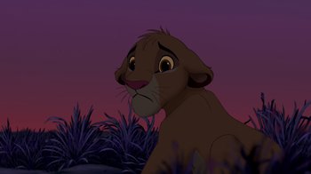 Movie still from “The Lion King” (1994), directed by Rob Minkoff – A lion in a field at night; Medium shot, Low angle