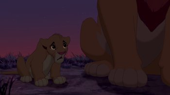 Movie still from “The Lion King” (1994), directed by Rob Minkoff – A lion cub looking at an adult elephant; Wide shot, Low angle