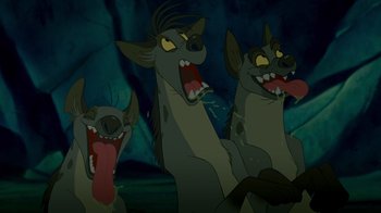 Movie still from “The Lion King” (1994), directed by Rob Minkoff – A group of hyenas with their mouths open; Medium shot, Low angle