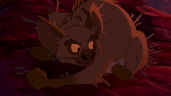 Movie still from “The Lion King” (1994), directed by Rob Minkoff – An image of an animal that is in the middle of a field; Close Up shot, High angle