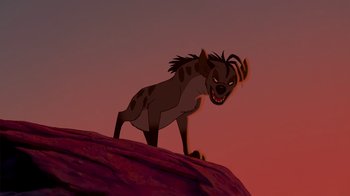 Movie still from “The Lion King” (1994), directed by Rob Minkoff – An animated character is standing on top of a hill; Medium shot, Low angle