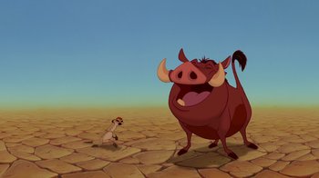 Movie still from “The Lion King” (1994), directed by Rob Minkoff – An animated scene of a dog chasing an animal; Wide shot, Low angle