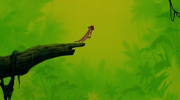 Movie still from “The Lion King” (1994), directed by Rob Minkoff – A painting of a monkey on a tree branch; Wide shot, Low angle