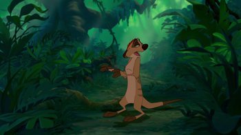 Movie still from “The Lion King” (1994), directed by Rob Minkoff – A dog standing in the middle of a forest; Wide shot, Low angle