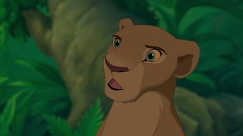 Movie still from “The Lion King” (1994), directed by Rob Minkoff – The face of a lioness in the jungle; Close Up shot, Low angle