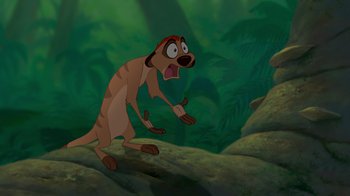 Movie still from “The Lion King” (1994), directed by Rob Minkoff – A dog that is walking in the grass; Medium shot, High angle