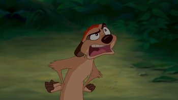 Movie still from “The Lion King” (1994), directed by Rob Minkoff – A dog with a hat on is looking angry; Close Up shot, Low angle