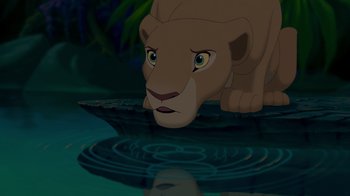 Movie still from “The Lion King” (1994), directed by Rob Minkoff – The face of a lioness in the water; Close Up shot, Low angle