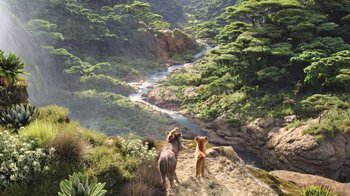 Movie still from “The Lion King” (2019), directed by Jon Favreau – A couple of dogs standing on top of a dirt hill; Extreme Wide shot, High angle