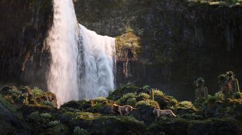 Movie still from “The Lion King” (2019), directed by Jon Favreau – Two goats standing in the grass near a waterfall; Extreme Wide shot, Low angle
