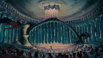 Movie still from “The Little Mermaid” (1989), directed by John Musker – A painting of people in a large room with a large waterfall in the center; Extreme Wide shot, High angle