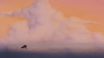 Movie still from “The Little Mermaid” (1989), directed by John Musker – An animal swimming in a body of water; Extreme Wide shot, Low angle