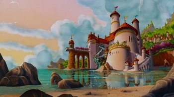 Movie still from “The Little Mermaid” (1989), directed by John Musker – A painting of a castle on the beach; Extreme Wide shot, Low angle