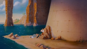 Movie still from “The Little Mermaid” (1989), directed by John Musker – A painting of a man sitting on a rock wall; Extreme Wide shot, Low angle
