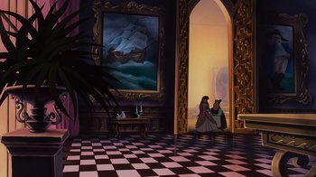 Movie still from “The Little Mermaid” (1989), directed by John Musker – A painting of a woman sitting in a chair next to a painting of a boat; Extreme Wide shot, High angle