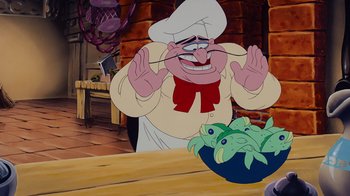 Movie still from “The Little Mermaid” (1989), directed by John Musker – A cartoon of a chef and a bowl of food; Medium shot, Over the shoulder angle