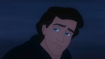 Movie still from “The Little Mermaid” (1989), directed by John Musker – A man's face with blue eyes; Close Up shot, Over the shoulder angle