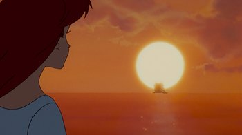 Movie still from “The Little Mermaid” (1989), directed by John Musker – A person looking out at the sun in the distance; Extreme Wide shot, Low angle