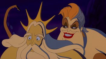 Movie still from “The Little Mermaid” (1989), directed by John Musker – A cartoon of ursula and the evil queen from the little mermaid; Close Up shot, Over the shoulder angle