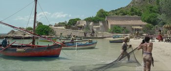 Movie still from “The Little Mermaid” (2023), directed by Rob Marshall – A group of boats in a body of water; Extreme Wide shot, Low angle