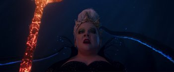 Movie still from “The Little Mermaid” (2023), directed by Rob Marshall – A person wearing a crown; Close Up shot, Low angle