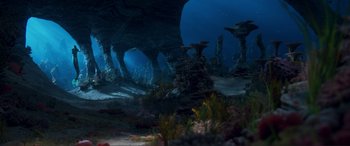 Movie still from “The Little Mermaid” (2023), directed by Rob Marshall – A view of the ocean from under the water; Extreme Wide shot, High angle