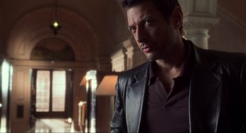 Movie still from “The Lost World: Jurassic Park” (1997), directed by Steven Spielberg – A person wearing a jacket; Medium shot, Low angle