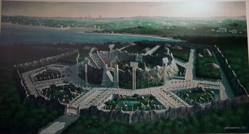 Movie still from “The Lost World: Jurassic Park” (1997), directed by Steven Spielberg – An aerial view of an amusement park with a lake in the background; Extreme Wide shot, High angle