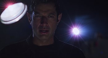 Movie still from “The Lost World: Jurassic Park” (1997), directed by Steven Spielberg – A person wearing a black shirt; Close Up shot, Low angle