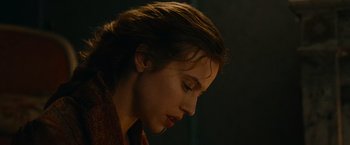 Movie still from “The Mad Women's Ball” (2021), directed by Mélanie Laurent – A person with long hair; Close Up shot, Low angle