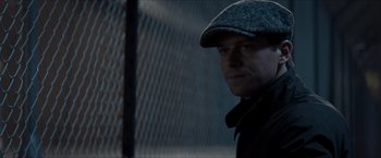 Movie still from “The Man from U.N.C.L.E.” (2015), directed by Guy Ritchie – A person wearing a hat; Close Up shot, Low angle