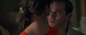 Movie still from “The Man from U.N.C.L.E.” (2015), directed by Guy Ritchie – A man and a woman looking at each other in a mirror; Close Up shot, Over the shoulder angle
