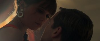Movie still from “The Man from U.N.C.L.E.” (2015), directed by Guy Ritchie – A man and a woman face to face in the dark; Close Up shot, Low angle